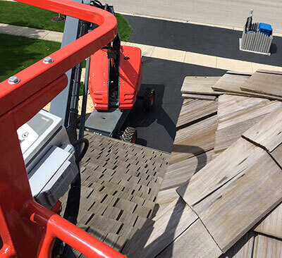 Machine to clean commercial roof