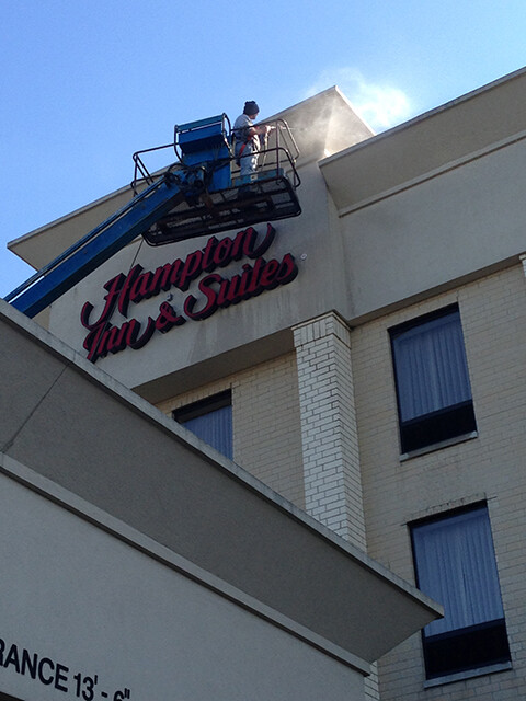 cleaning hotel facade